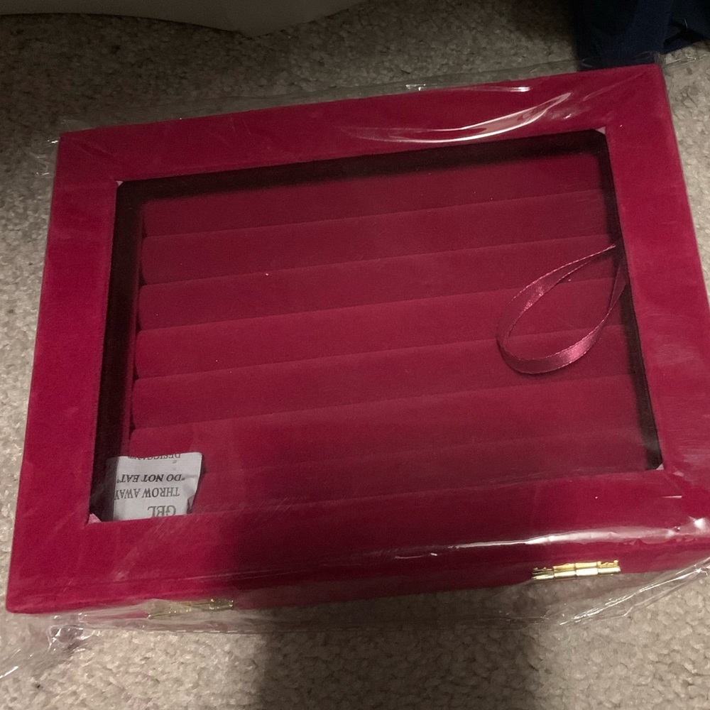 Brand new I package ring box, holds 50 rings.